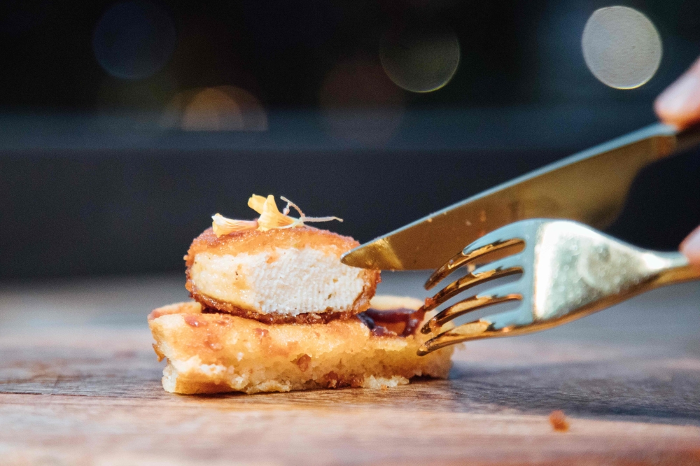 This undated handout from Eat Just released on December 19, 2020 shows a nugget made from lab-grown chicken meat at a restaurant in Singapore, which became the first country to allow meat created without slaughtering any animals to be sold. AFP PHOTO / EA