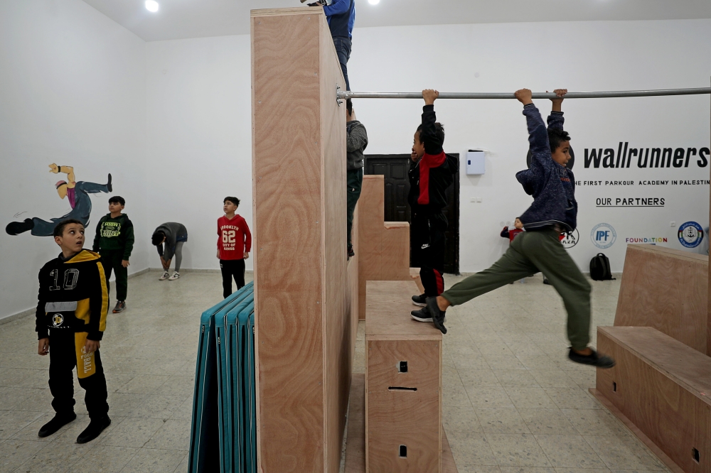 Palestinian Parkour enthusiasts exercise in a training facility in Gaza City December 16, 2020. Reuters/Mohammed Salem