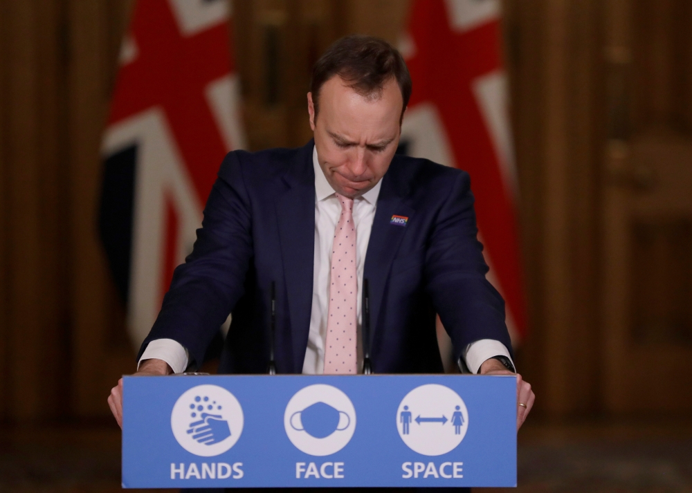 Britain's Health Secretary Matt Hancock, speaks on further restrictions to be put in place due to the ongoing coronavirus disease (COVID-19) pandemic at a news conference inside 10 Downing Street in London, Britain December 23, 2020. Kirsty Wigglesworth/ 