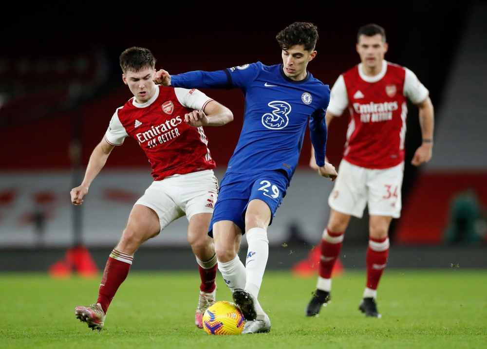  Chelsea's Kai Havertz in action with Arsenal's Kieran Tierney Pool via REUTERS/Andrew Boyers