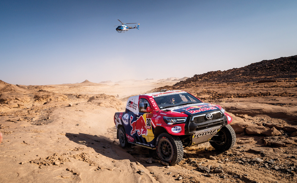 Toyota's Qatari driver Nasser Al Attiyah and navigator MatthieuBaumel in their Toyota Hilux during the third stage of the 2021 Dakar Rally yesterday.