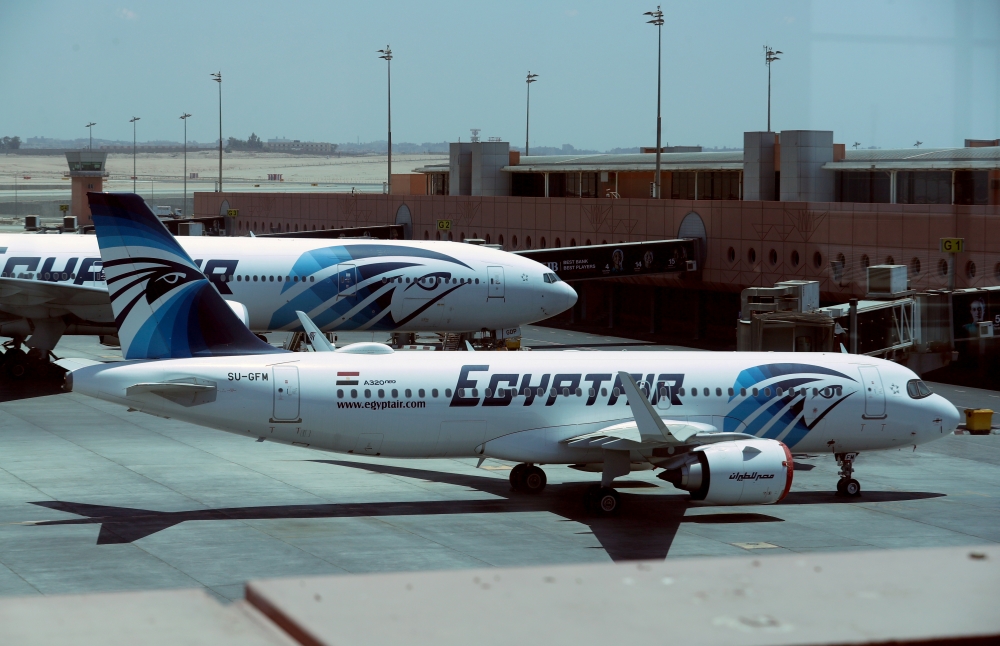 EgyptAir planes are seen on the tarmac, following an outbreak of the coronavirus disease (COVID-19), at Cairo International Airport in Cairo, Egypt, June 18, 2020. REUTERS/Mohamed Abd El Ghany/File Photo