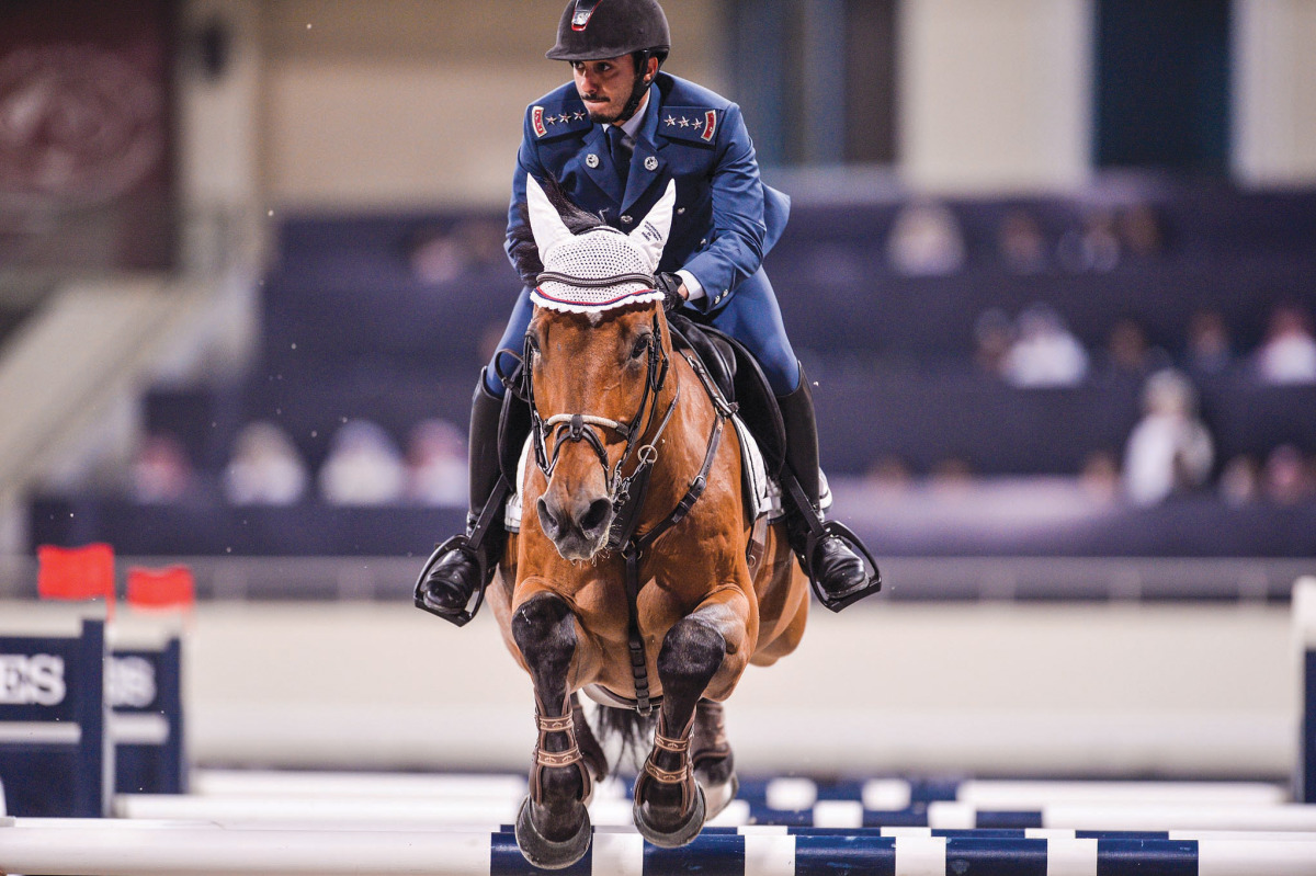 Faleh Suwead Al Ajami guiding Ulano over a hurdle during the Big Tour event.