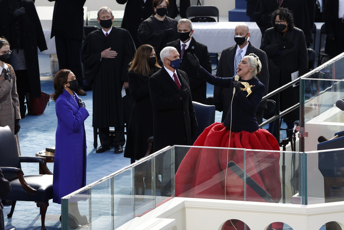 Lady Gaga sings the National Anthem as U.S. Vice President Mike Pence and Vice President-elect Kamala Harris look on during the National Anthem during the inauguration of Joe Biden as the 46th President of the United States on the West Front of the U.S. C