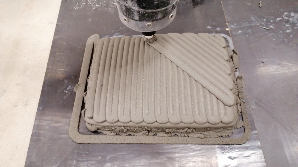 Concrete being 3D printed in lobster-inspired patterns at an RMIT lab in Melbourne, Australia in this still image obtained from video obtained by Reuters on January 21, 2021. RMIT ACCESS/Handout via Reuters