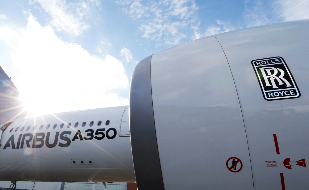 An Airbus A350 is pictured with a Rolls-Royce logo at the Airbus headquarters in Toulouse, France December 4, 2014. REUTERS/ Regis Duvignau/File Photo