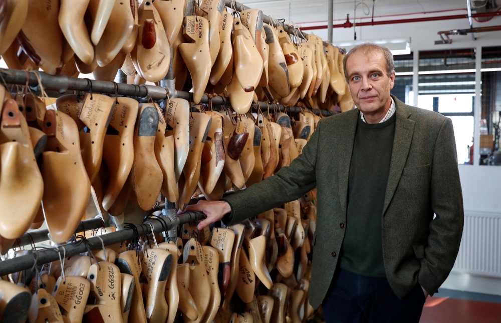 Martin Mason, managing director of British luxury shoemaker Trickers attends an interview where he discusses European Union customers affected by new tax costs and an increase in product returns, in Northampton, Britain, January 25, 2021. Reuters/Matthew 