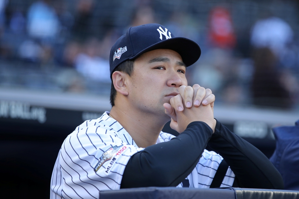  Oct 15, 2019; Bronx, NY, USA; New York Yankees starting pitcher Masahiro Tanaka (19) looks on before game three of the 2019 ALCS playoff baseball series against the Houston Astros at Yankee Stadium. Mandatory Credit: Brad Penner-USA TODAY Sports/File Pho