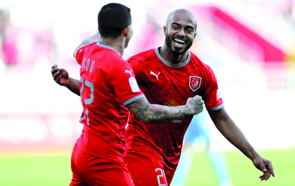 Al Duhail's Ali Afif celebrates with a team-mate in this file photo.