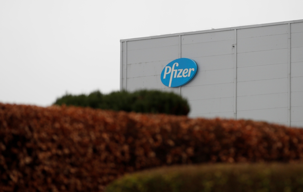 The Pfizer logo is seen at their global supply site in Havant, Britain, February 1, 2021. REUTERS/Matthew Childs