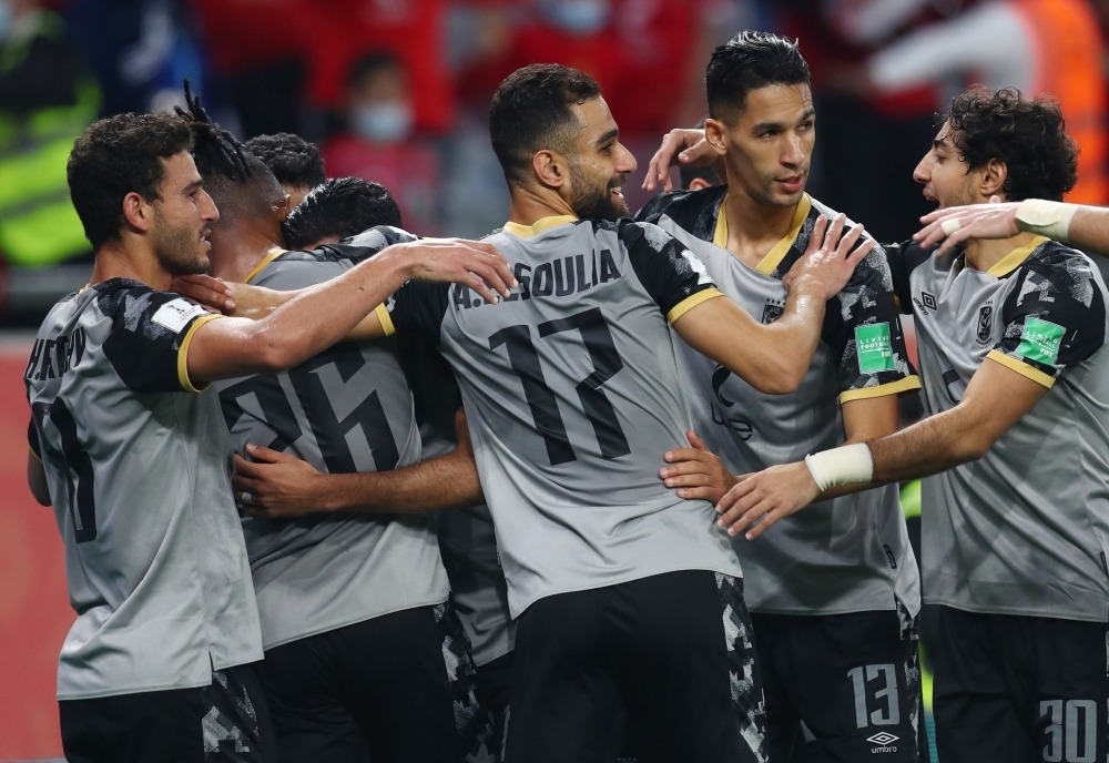 Education City Stadium, Al Rayyan, Qatar - February 4, 2021 Al Ahly's Hussein Elshahat celebrates scoring their first goal with teammates REUTERS/Ibraheem Al Omari