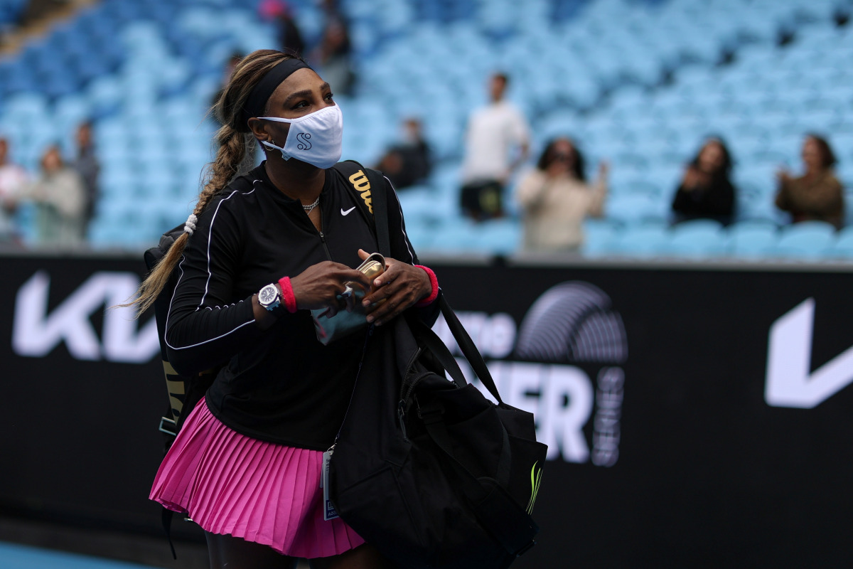 Serena Williams of the U.S. departs the court in a face mask after defeating Daria Gavrilova of Australia in the Yarra Valley Classic tennis tournament at Melbourne Park in Melbourne, Australia, February 1, 2021. Picture taken February 1, 2021. REUTERS/Lo