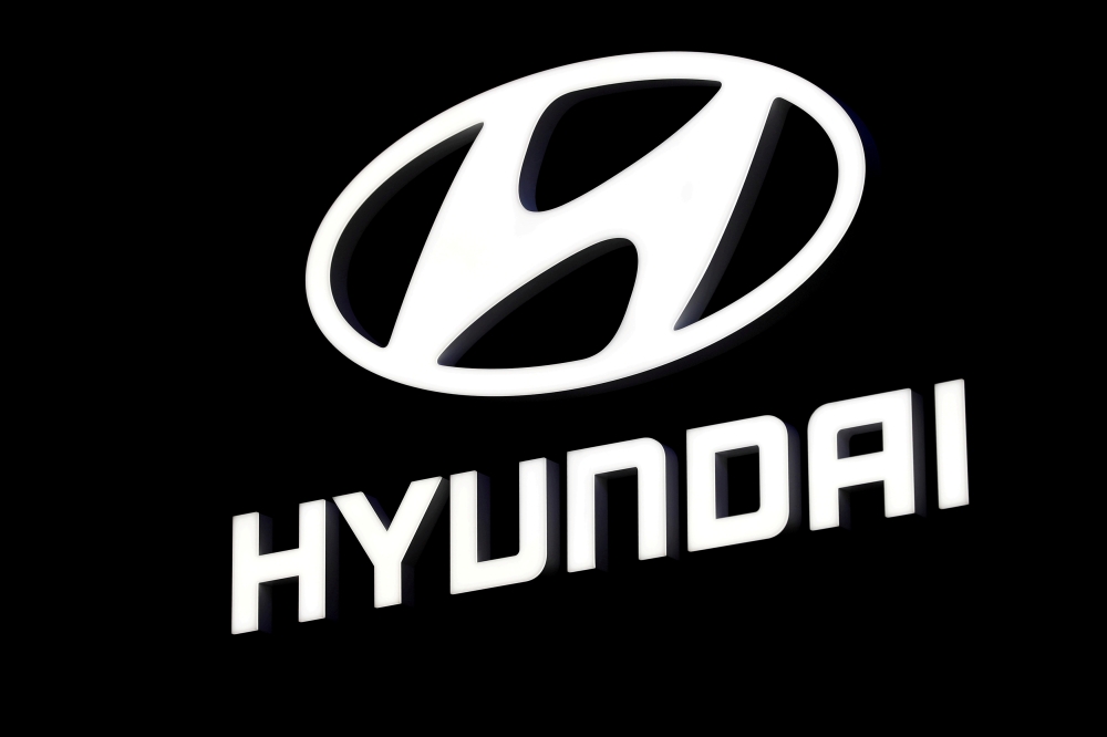 A Hyundai booth displays the company logo at the North American International Auto Show in Detroit, Michigan, U.S. January 16, 2018. Reuters/Jonathan Ernst/File Photo