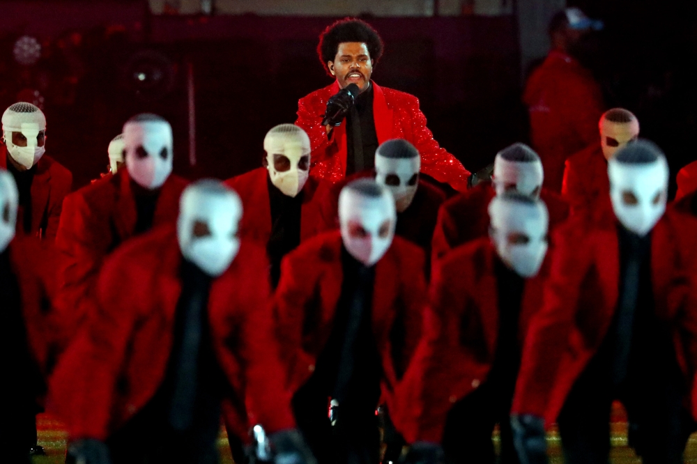 Feb 7, 2021; Tampa, FL, USA; The Weeknd performs during the Super Bowl Halftime Show in Super Bowl LV at Raymond James Stadium. Mandatory Credit: Mark J. Rebilas-USA TODAY Sports
