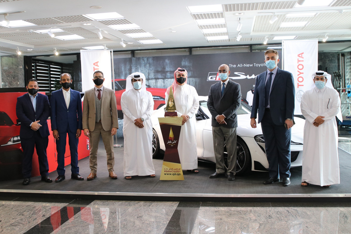 Officials from Abdullah Abdulghani & Bros. Co. (AAB) and Qatar Stars League, during the Qatar Cup Trophy Tour at the AAB Tower’s Toyota showroom in Doha, recently. 