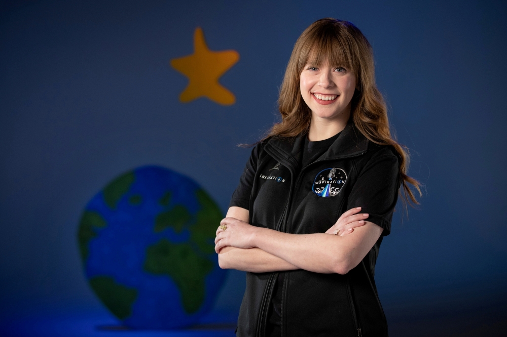 Hayley Arceneaux, a 29-year-old physician assistant at St. Jude Children's Research Hospital and pediatric bone cancer survivor, who has been chosen for historic Inspiration4 all-civilian mission to Space, poses in an undated photograph. St. Jude Children