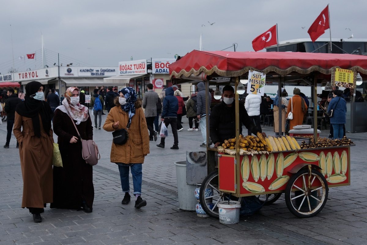 People wearing protective masks stroll at Eminonu district amid the coronavirus disease (COVID-19) outbreak, in Istanbul, Turkey March 3, 2021. REUTERS/Murad Sezer
