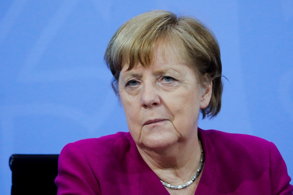 German Chancellor Angela Merkel attends a news conference after a meeting with state leaders to discuss options beyond the end of the pandemic lockdown, amid the outbreak of the coronavirus disease (COVID-19), in Berlin, Germany, March 3, 2021. Markus Sch