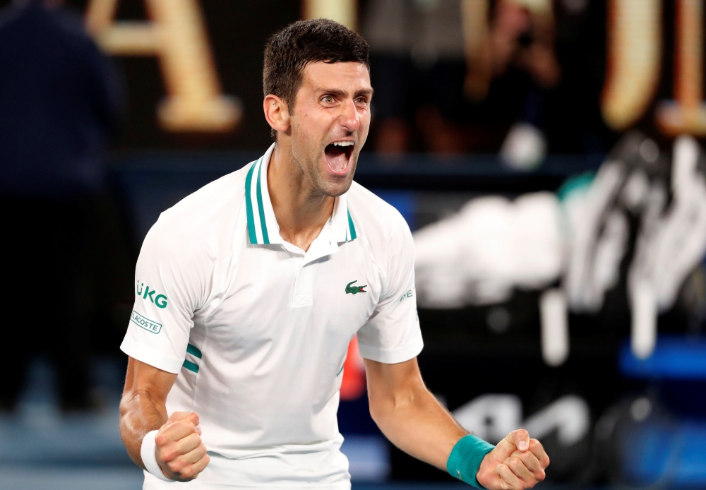 February 21, 2021 Serbia's Novak Djokovic celebrates winning his final match against Russia's Daniil Medvedev REUTERS/Asanka Brendon Ratnayake/File Photo