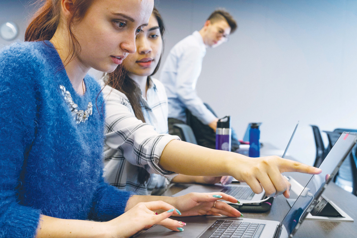 Northwestern Qatar students Evghenia Scripinc (left) and Farina Amir