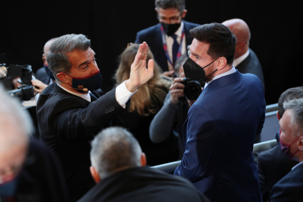 Soccer Football - Joan Laporta, inauguration ceremony of the presidency of FC Barcelona - Camp Nou, Barcelona, Spain - March 17, 2021 Barcelona's Lionel Messi and Joan Laporta before the start of the inauguration ceremony REUTERS/Albert Gea
