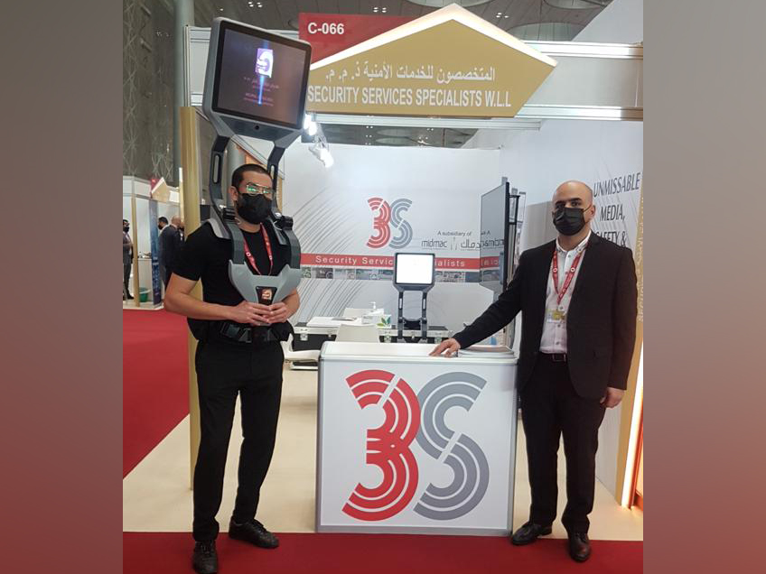 Samer Mezghani, Chief Operations Officer, Security Services Specialists (3S) with a person displaying iWalker at the booth.