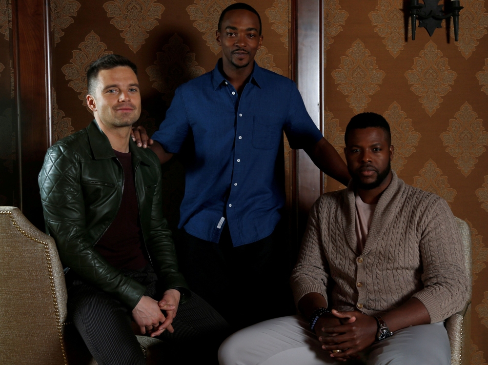 Cast members Sebastian Stan (L), Winston Duke (R) and Anthony Mackie pose for a portrait while promoting the 