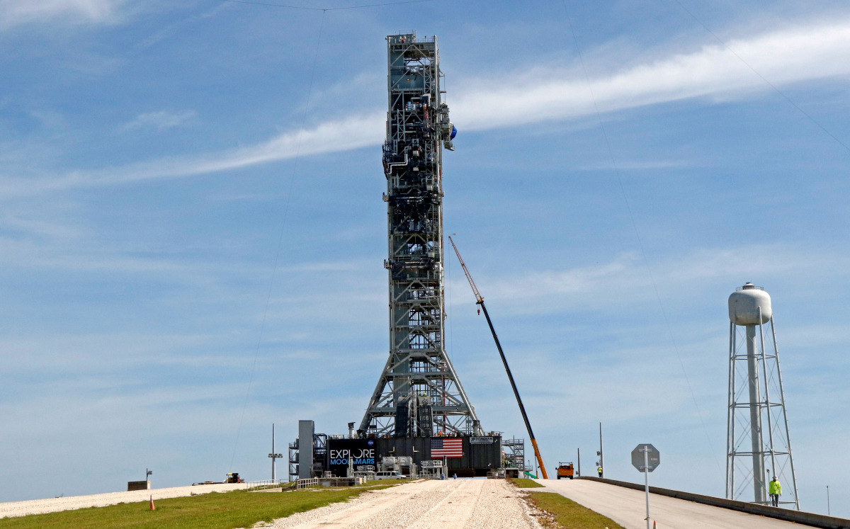 FILE PHOTO: Nasa's Space Launch System mobile launcher stands atop Launch Pad 39B for months of testing before it will launch the SLS rocket and Orion spacecraft on mission Artemis 1 at the Kennedy Space Center in Cape Canaveral, Florida, U.S., July 1, 20