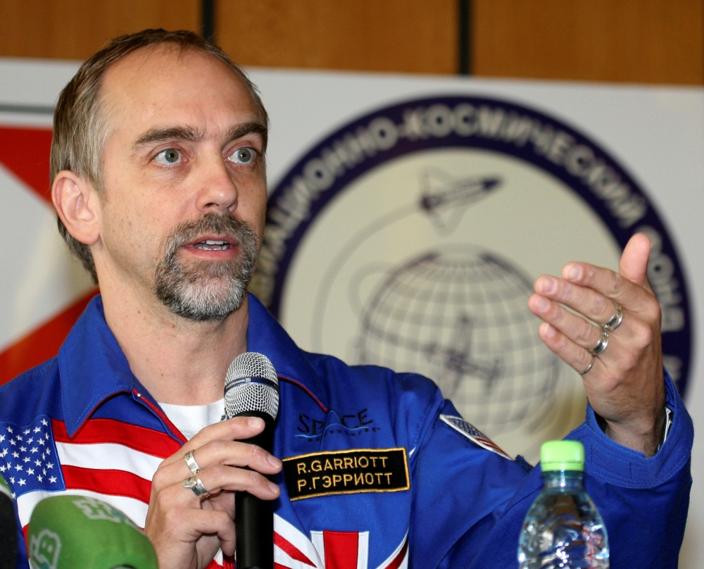  U.S. space tourist Richard Garriott speaks during a news conference at Star City outside Moscow, October 27, 2008. REUTERS/Sergei Remezov (RUSSIA)/File Photo