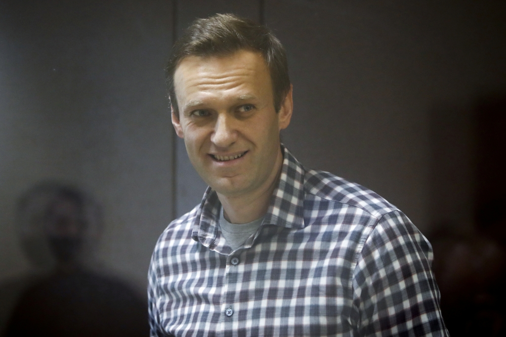 FILE PHOTO: Russian opposition politician Alexei Navalny attends a court hearing in Moscow, Russia February 20, 2021. REUTERS/Maxim Shemetov