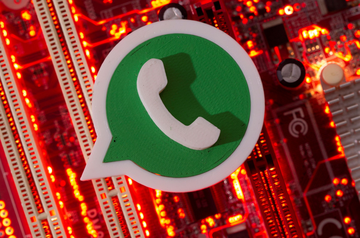 FILE PHOTO: A 3D printed Whatsapp logo is placed on a computer motherboard in this illustration taken January 21, 2021. REUTERS/Dado Ruvic/Illustration/File Photo
