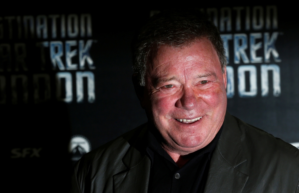 William Shatner who plays Captain James T. Kirk in the original version of Star Trek arrives at the Destination Star Trek London event October 19, 2012. REUTERS/Suzanne Plunkett/File Photo