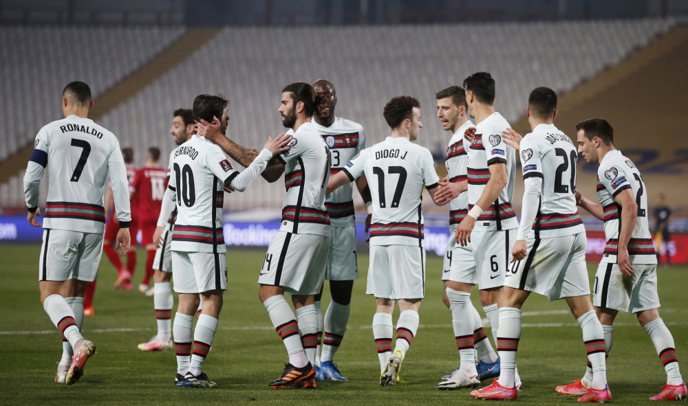 Portugal's Diogo Jota celebrates scoring their second goal with teammates Reuters/Novak Djurovic
