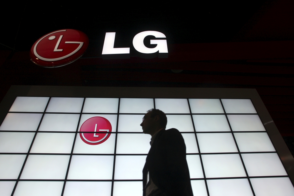 A show attendee passes by the LG Electronics booth during the 2009 International Consumer Electronics Show (CES) in Las Vegas, Nevada, January 9, 2009. REUTERS/Steve Marcus/File Photo