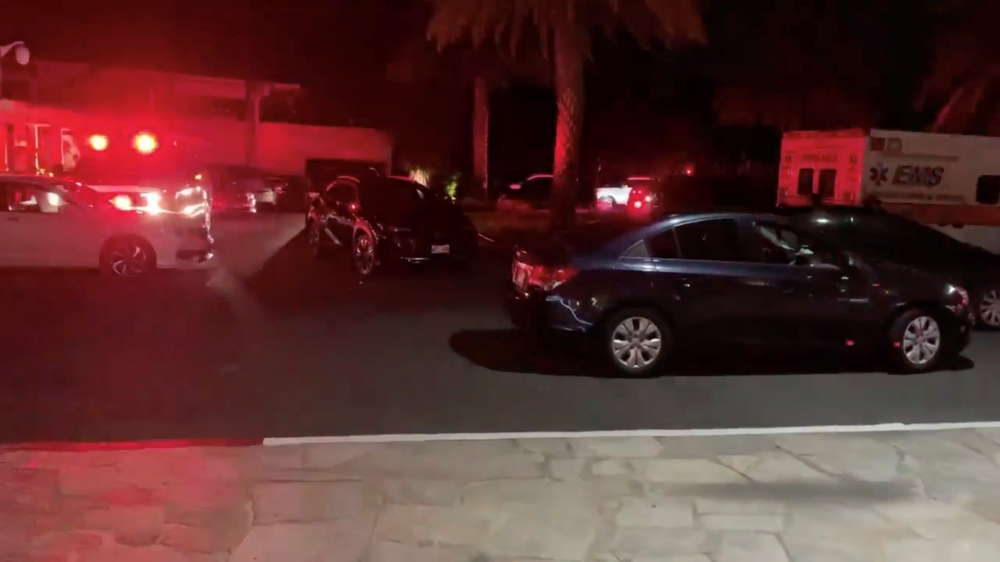 Emergency response vehicles are parked at Kahala Resort & Hotel in Honolulu, Hawaii, U.S., April 10, 2021 in this still image obtained from social media video. Corey Funai via REUTERS