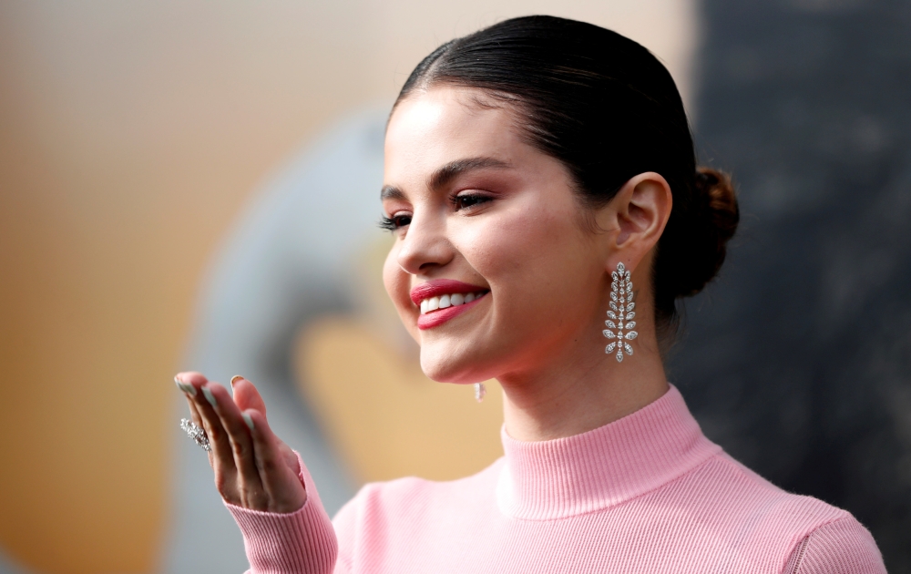 Cast member Selena Gomez poses at the premiere for the film 