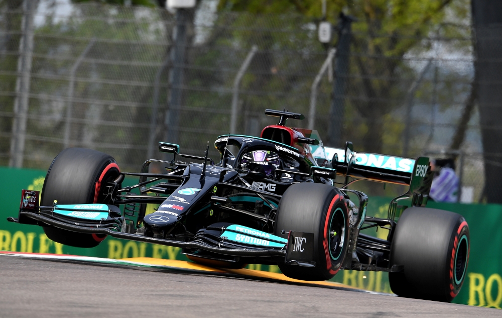FILE PHOTO: Emilia Romagna Grand Prix - Autodromo Enzo e Dino Ferrari, Imola, Italy - April 17, 2021 Mercedes' Lewis Hamilton in action during practice REUTERS/Jennifer Lorenzini 