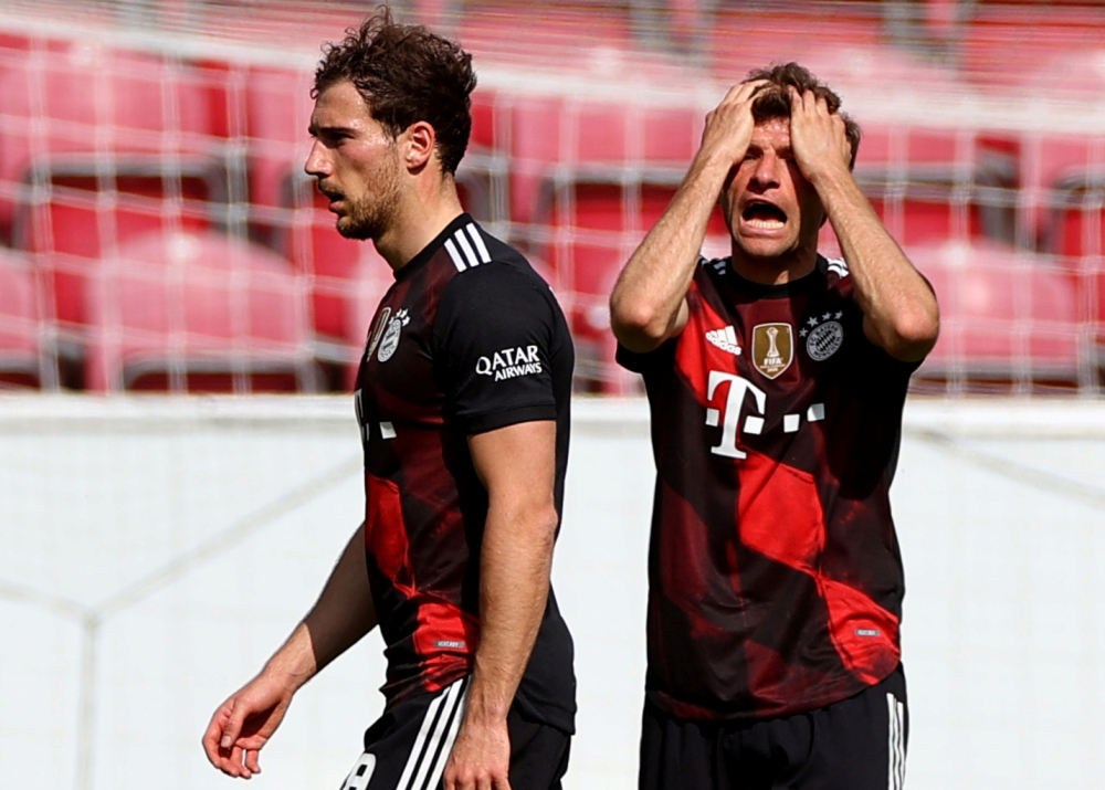 Bayern Munich's Thomas Muller reacts Pool via REUTERS/Kai Pfaffenbach