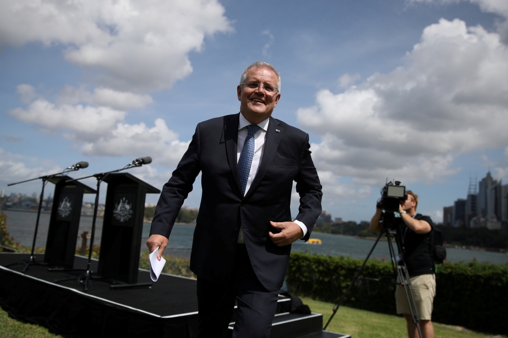 Australian Prime Minister Scott Morrison departs a joint press conference held with New Zealand Prime Minister Jacinda Ardern at Admiralty House in Sydney, Australia, February 28, 2020. Reuters/Loren Elliott/File Photo