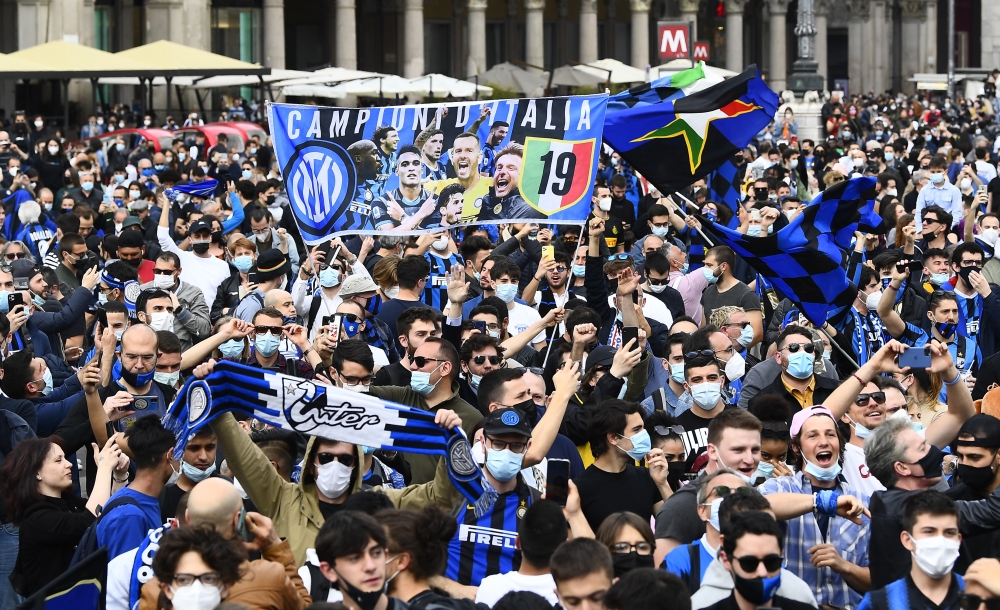 May 2, 2021 Inter Milan fans celebrate winning Serie A outside the Duomo di Milano REUTERS/Flavio Lo Scalzo