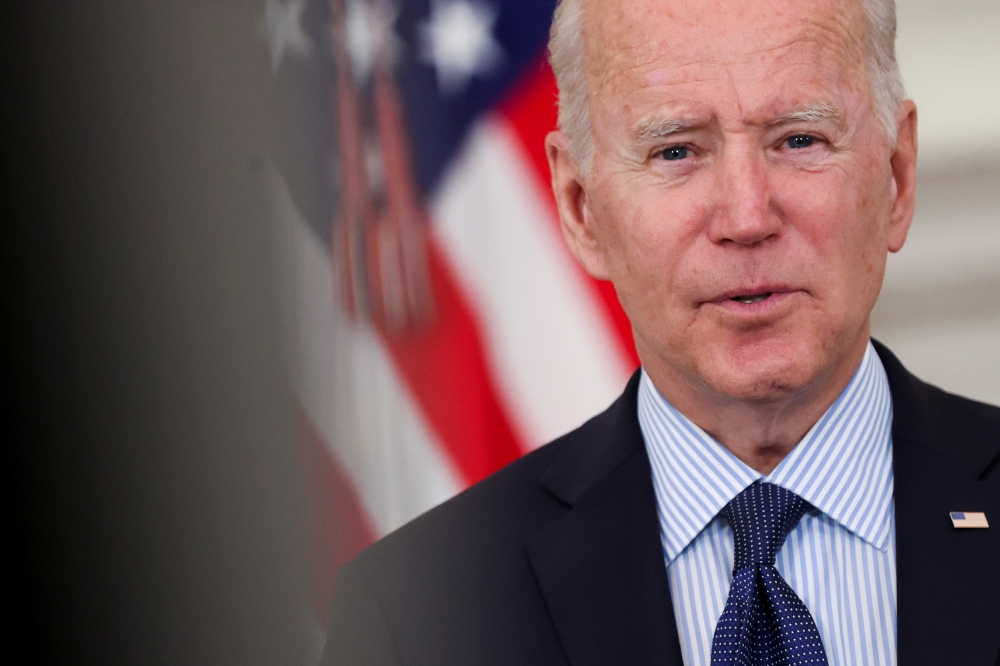 U.S. President Joe Biden delivers remarks on the state of the coronavirus disease (COVID-19) vaccinations from the State Dining Room at the White House in Washington, D.C., U.S., May 4, 2021. REUTERS/Jonathan Ernst