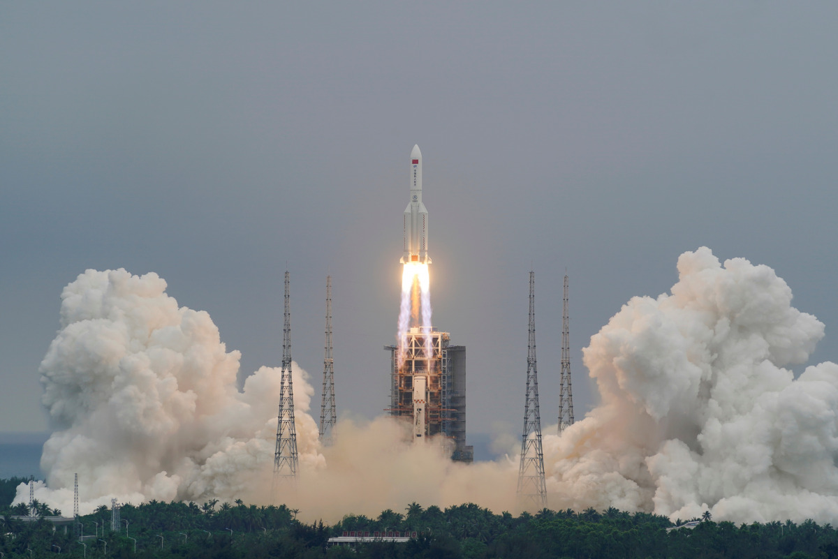 FILE PHOTO: The Long March-5B Y2 rocket, carrying the core module of China's space station Tianhe, takes off from Wenchang Space Launch Center in Hainan province, China April 29, 2021. China Daily via REUTERS 