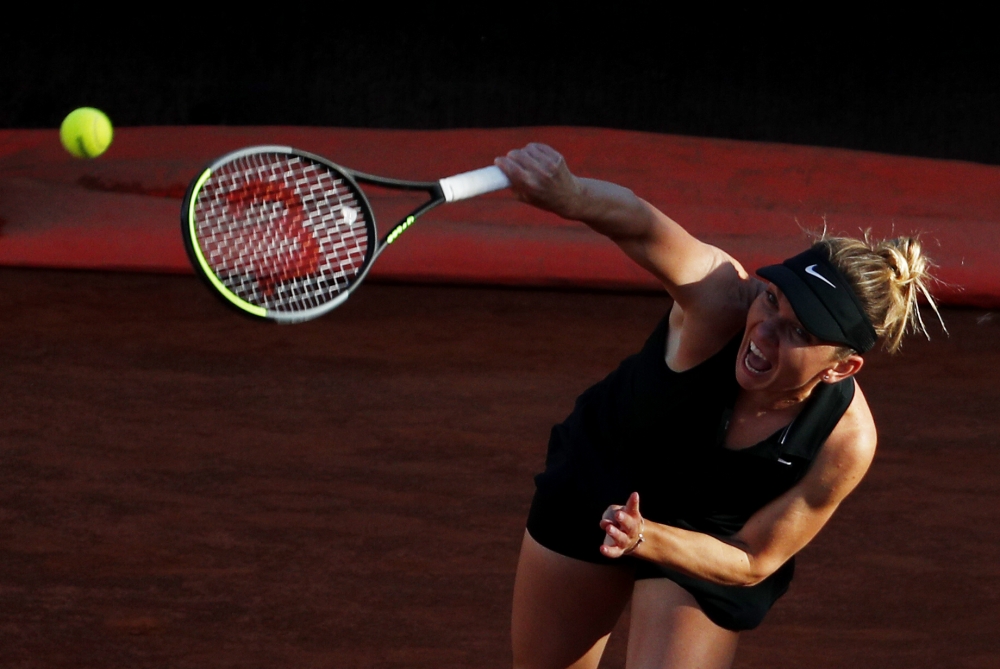 May 12, 2021 Romania's Simona Halep in action during her second round match against Germany's Angelique Kerber REUTERS/Guglielmo Mangiapane