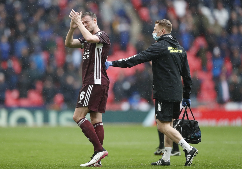 Leicester City's Jonny Evans applauds the fans as he is substituted off after sustaining an injury Pool via REUTERS/Matthew Childs