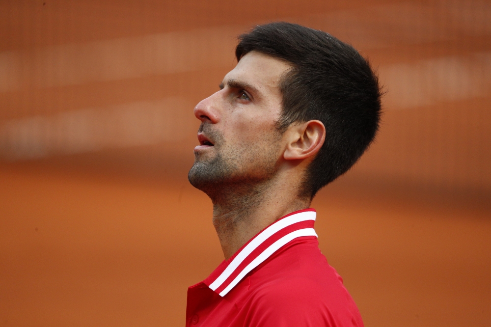 May 16, 2021 Serbia's Novak Djokovic reacts during his final match against Spain's Rafael Nadal REUTERS/Guglielmo Mangiapane