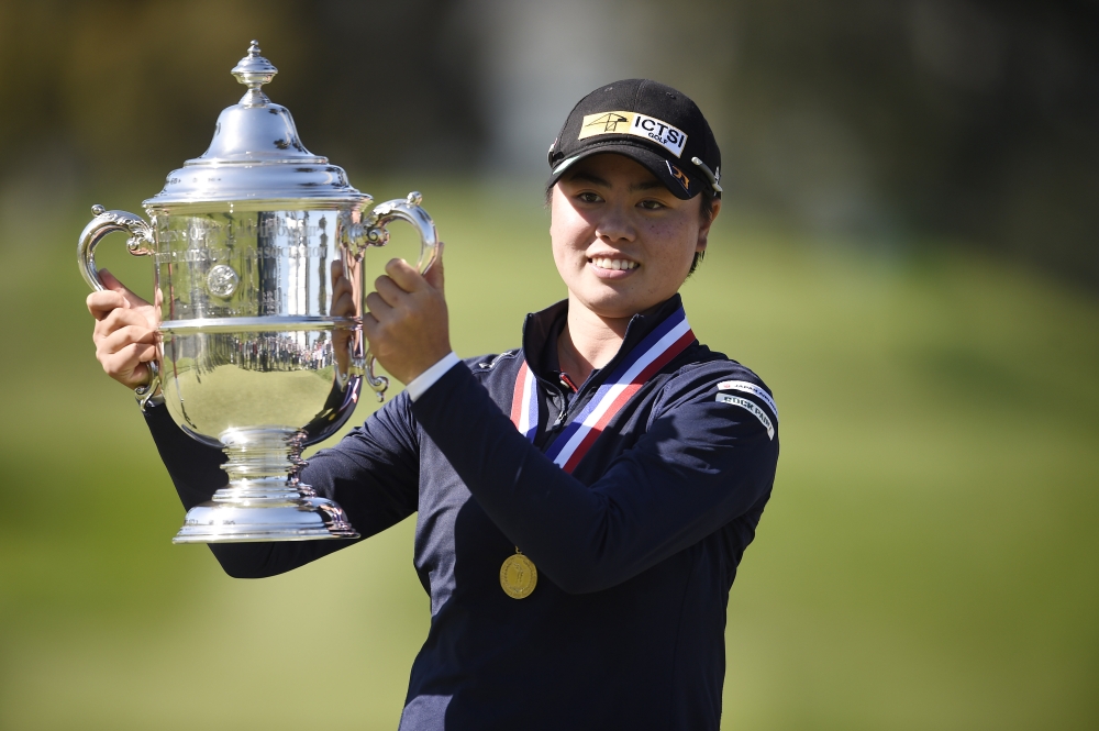 Yuka Saso hoists the US Open trophy after winning in a sudden death playoff over Nasa Hataoka following the final round of the U.S. Women's Open golf tournament at The Olympic Club. Mandatory Credit: Kelvin Kuo-USA TODAY Sports