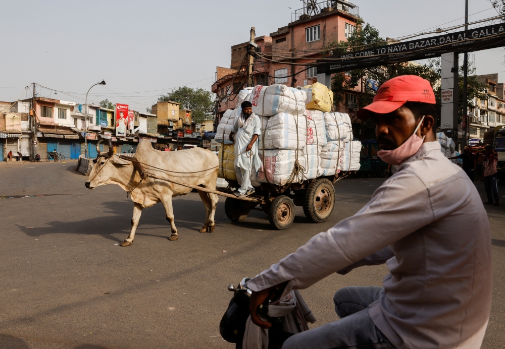 Authorities eased lockdown restrictions that were imposed to slow the spread of the coronavirus disease (COVID-19), in the old quarters of Delhi, India, June 8, 2021. Reuters/Adnan Abidi