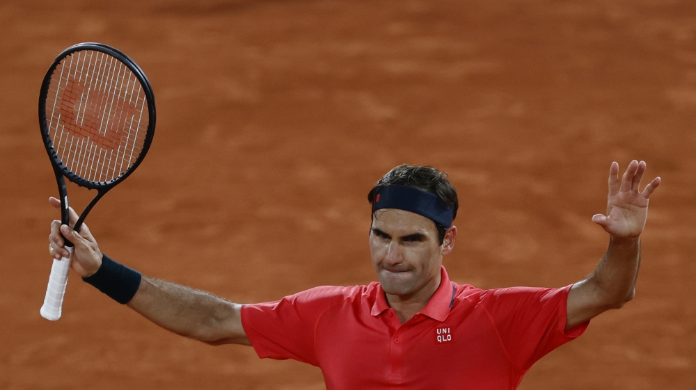 June 5, 2021 Switzerland's Roger Federer celebrates after winning his third round match against Germany's Dominik Koepfer REUTERS/Christian Hartmann
