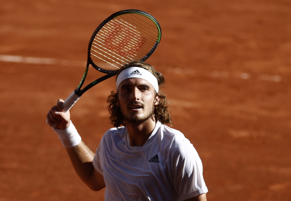 June 11, 2021 Greece's Stefanos Tsitsipas celebrates winning his semi final match against Germany's Alexander Zverev REUTERS/Christian Hartmann