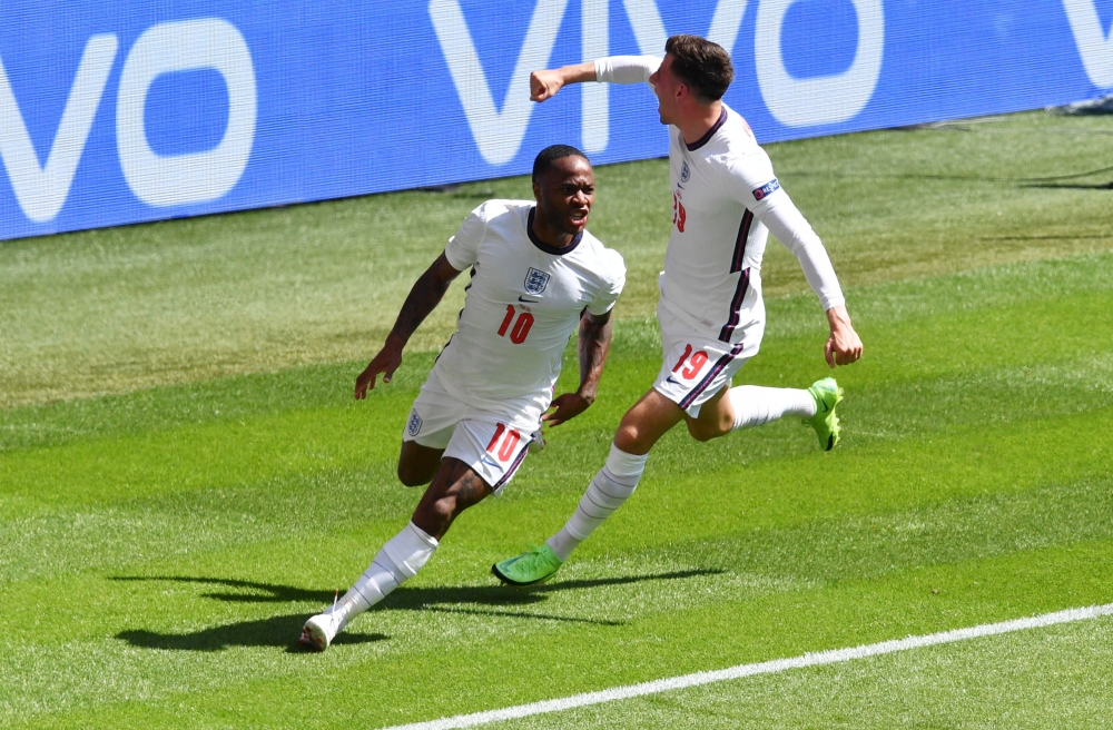 England's Raheem Sterling celebrates scoring their first goal with Mason Mount Pool via REUTERS/Justin Tallis